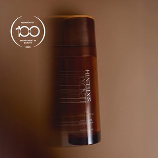 Bottle, standing, with brown background. Text: "NEWBEAUTY 100 WHAT'S NEXT IN BEAUTY 2025. LENOX SIXTEENTH THE LASER SERUM TRIPLE-ACID CONCENTRATE 50 ML 1.7 FL OZ."
